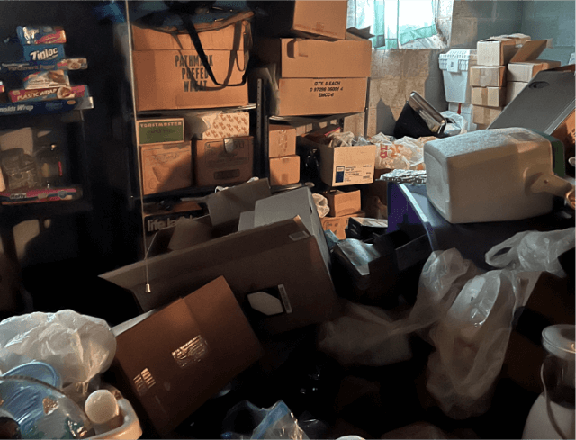 Boxes of junk and clutter taking up tons of space in a Delaware basement